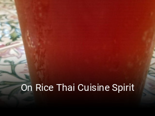 On Rice Thai Cuisine Spirit book table