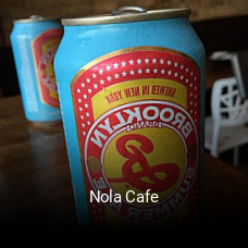 Nola Cafe book table